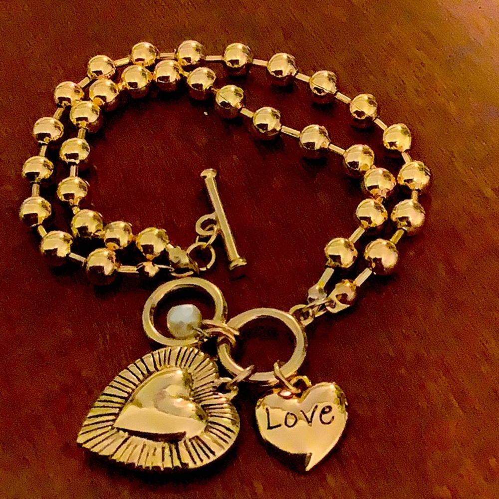 🦋 A BLONDE & HER BAG gold tone bracelet, 7.5” long. Toggle closure.
